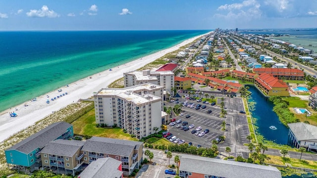 bird's eye view with a view of the beach and a water view