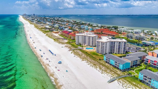 bird's eye view with a beach view and a water view