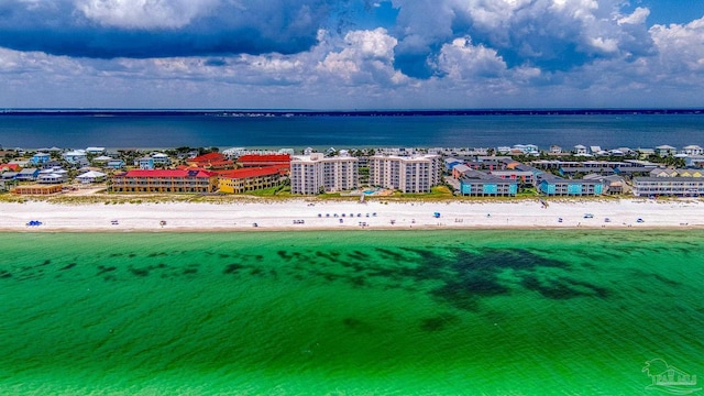 birds eye view of property featuring a view of the beach and a water view