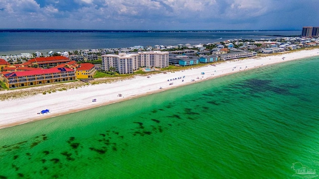 bird's eye view with a water view and a view of the beach