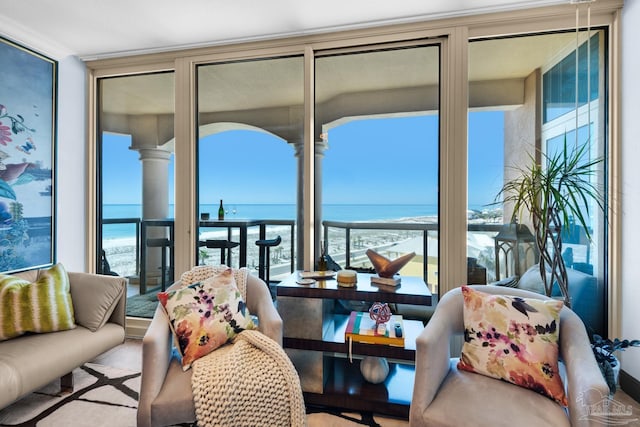 5 Portofino Dr Unit 703, Pensacola Beach, FL 32561 - sunroom featuring a water view