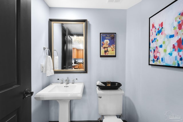 5 Portofino Dr Unit 703, Pensacola Beach, FL 32561 - half bathroom with toilet