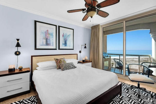 5 Portofino Dr Unit 703, Pensacola Beach, FL 32561 - bedroom with a water view, access to outside, crown molding, expansive windows, and a ceiling fan