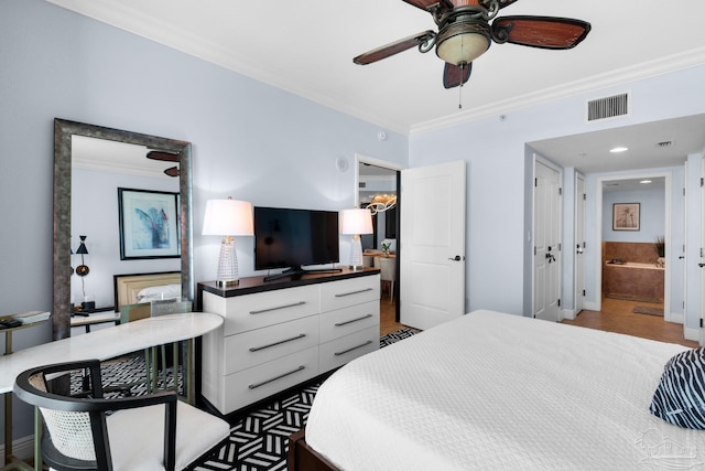 5 Portofino Dr Unit 703, Pensacola Beach, FL 32561 - bedroom with ornamental molding, connected bathroom, and a ceiling fan