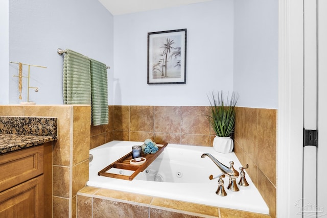5 Portofino Dr Unit 703, Pensacola Beach, FL 32561 - bathroom with vanity and a whirlpool tub