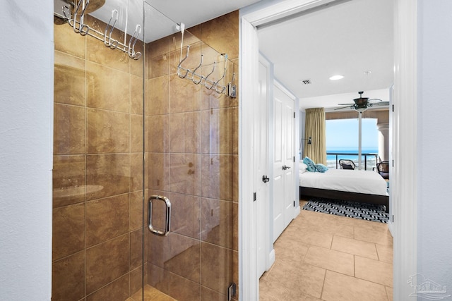 5 Portofino Dr Unit 703, Pensacola Beach, FL 32561 - bathroom featuring ensuite bath, a shower stall, ceiling fan, tile patterned floors, and recessed lighting