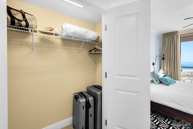 5 Portofino Dr Unit 703, Pensacola Beach, FL 32561 - laundry room featuring baseboards