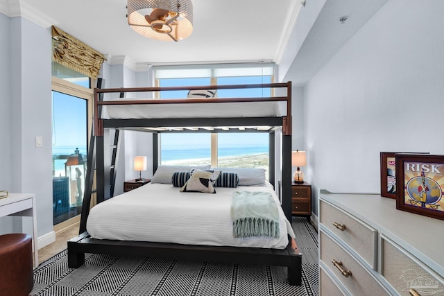 5 Portofino Dr Unit 703, Pensacola Beach, FL 32561 - bedroom with ornamental molding and multiple windows