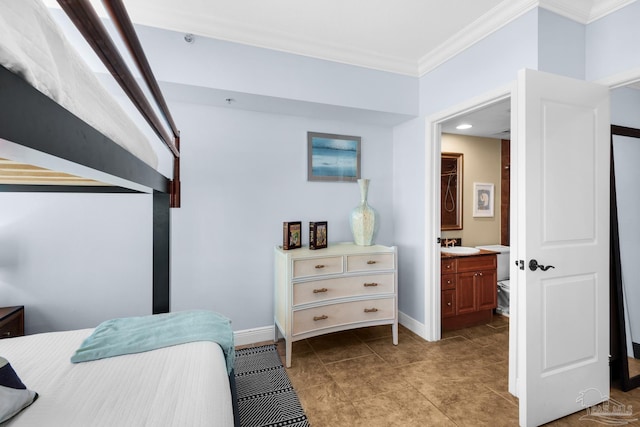 5 Portofino Dr Unit 703, Pensacola Beach, FL 32561 - bedroom featuring crown molding and ensuite bathroom