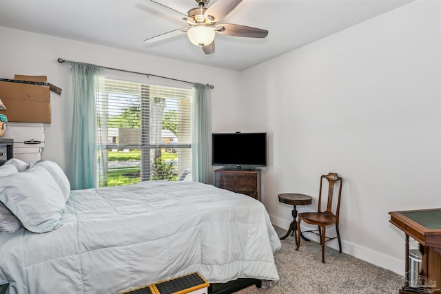 carpeted bedroom featuring ceiling fan