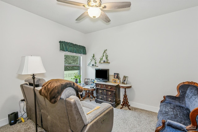 living room featuring ceiling fan and light carpet