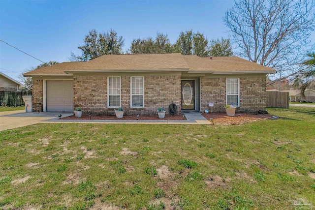 ranch-style home with a front lawn, brick siding, a garage, and driveway