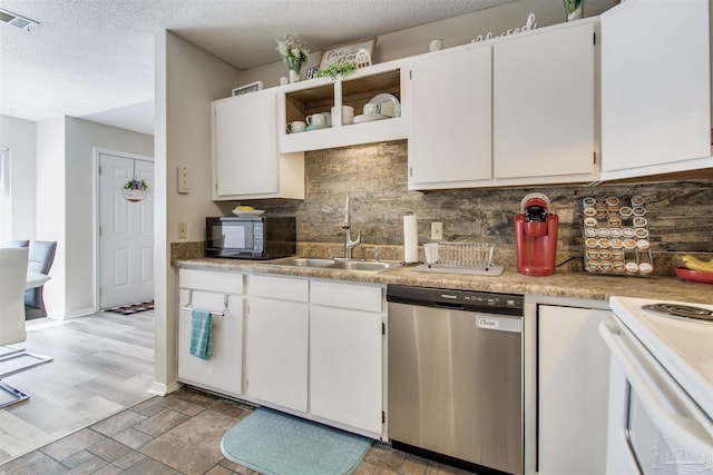 kitchen featuring visible vents, a sink, white cabinets, black microwave, and dishwasher