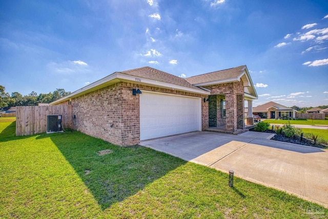 view of home's exterior with a garage, central AC, and a lawn