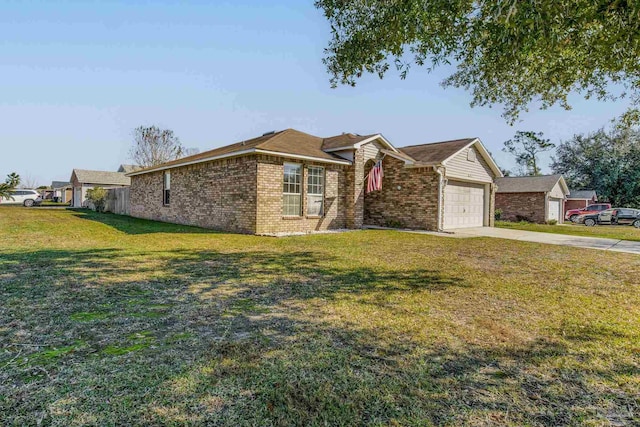 ranch-style house featuring a garage and a front lawn