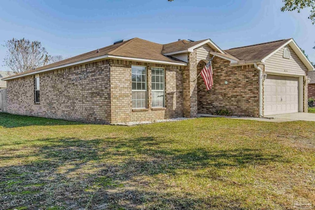 ranch-style house featuring a garage and a front yard