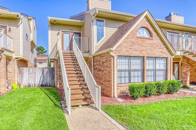 view of property with a front yard