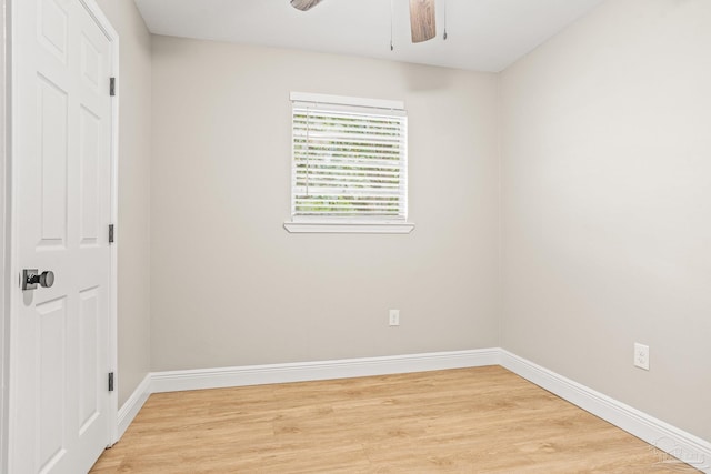 spare room featuring ceiling fan and light hardwood / wood-style floors