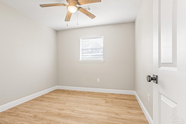 empty room with ceiling fan and light wood-type flooring