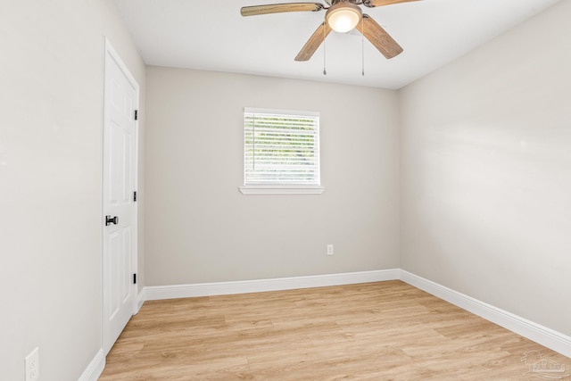 empty room featuring ceiling fan and light wood-type flooring