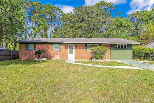 ranch-style home with a front lawn