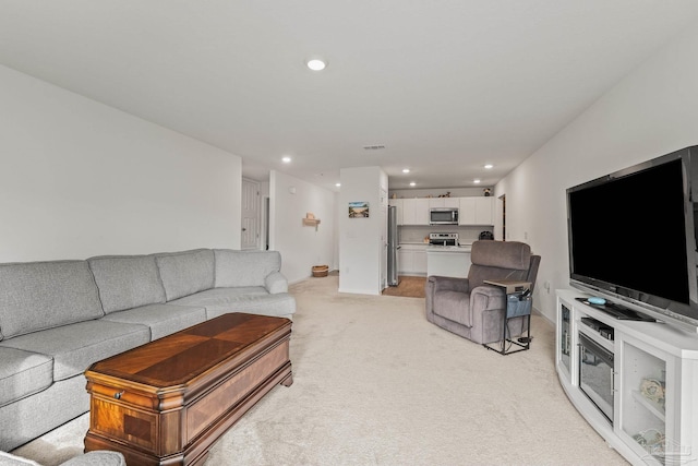 living room with light carpet