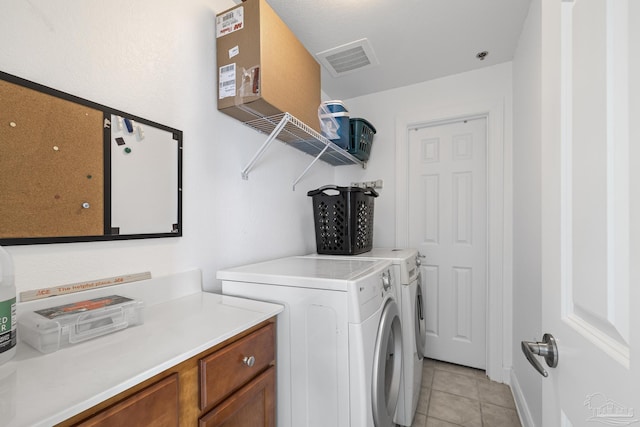 850 Ft Pickens Rd Unit 1230, Pensacola Beach, FL 32561 - laundry room featuring independent washer and dryer and light tile patterned floors
