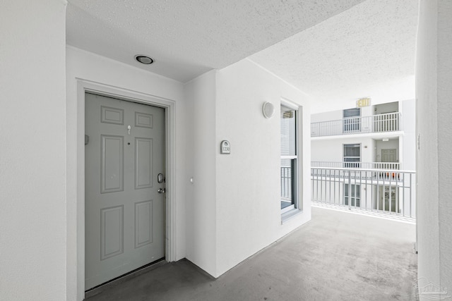 850 Ft Pickens Rd Unit 1230, Pensacola Beach, FL 32561 - entrance to property with stucco siding and a balcony