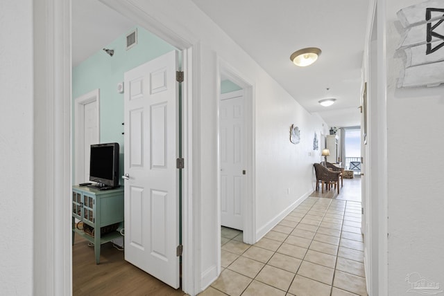 850 Ft Pickens Rd Unit 1230, Pensacola Beach, FL 32561 - hall with light tile patterned floors and baseboards