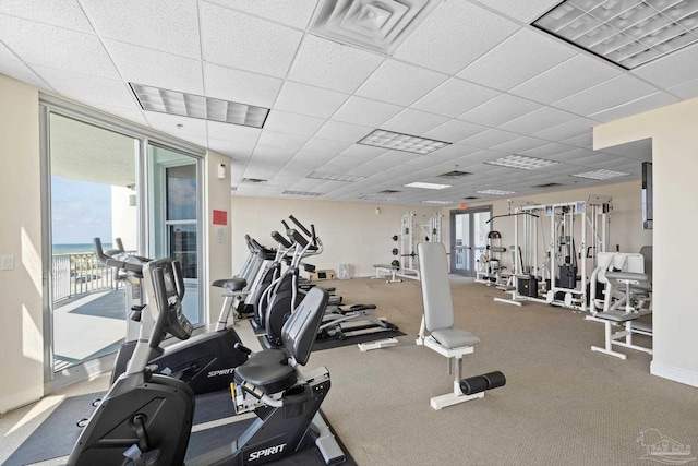 850 Ft Pickens Rd Unit 1230, Pensacola Beach, FL 32561 - exercise room with a drop ceiling and floor to ceiling windows