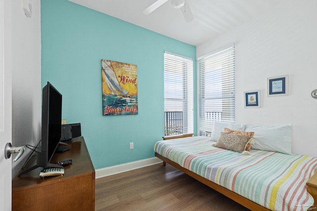 850 Ft Pickens Rd Unit 1230, Pensacola Beach, FL 32561 - bedroom with wood finished floors, baseboards, a desk, and ceiling fan