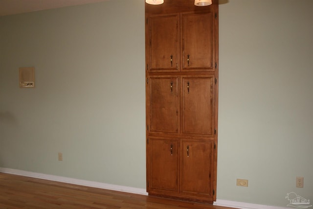 spare room featuring light wood-type flooring