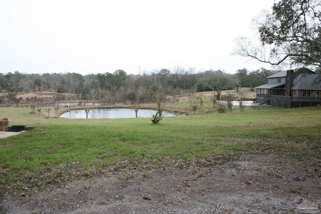 view of yard with a water view