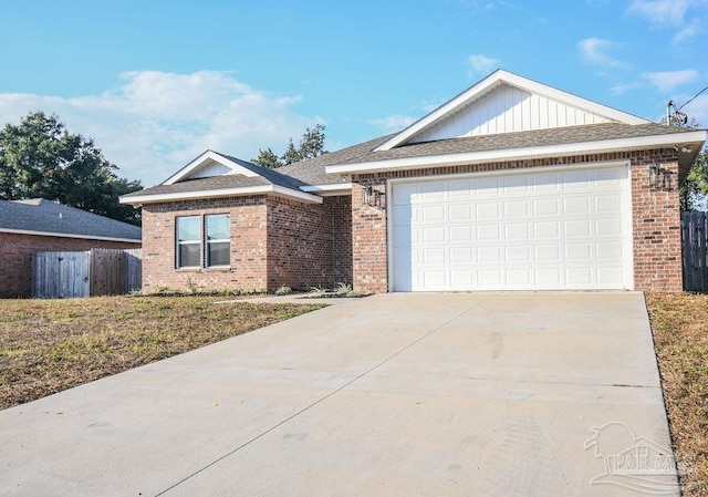 single story home featuring a garage