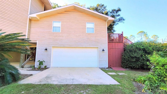 view of property exterior with a garage