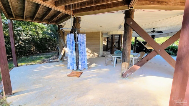 view of patio / terrace featuring ceiling fan