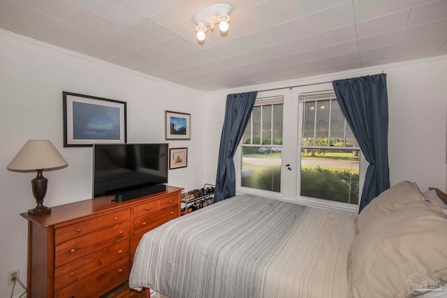 bedroom with ornamental molding