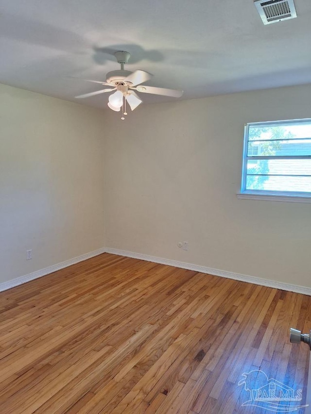 unfurnished room featuring light hardwood / wood-style floors and ceiling fan