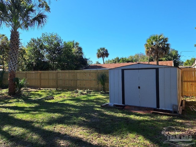 view of outbuilding featuring a lawn