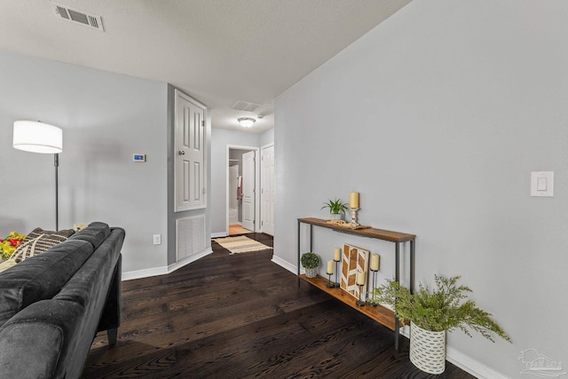 hall with dark hardwood / wood-style floors