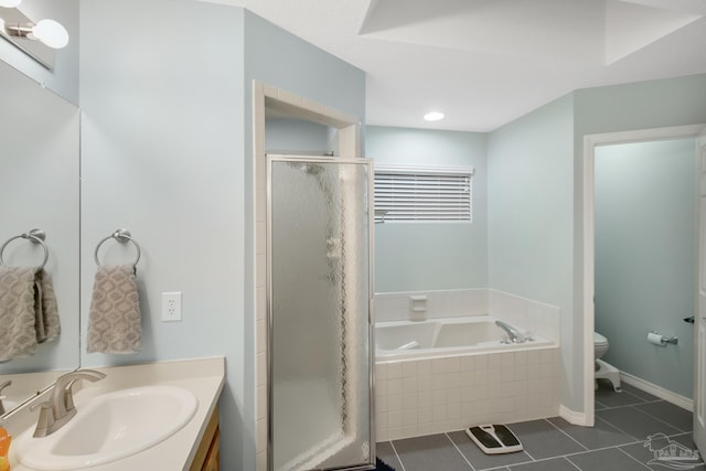 full bathroom featuring vanity, toilet, plus walk in shower, and tile patterned floors