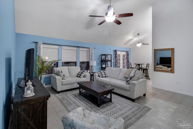 living room featuring high vaulted ceiling, ceiling fan, and light tile patterned floors