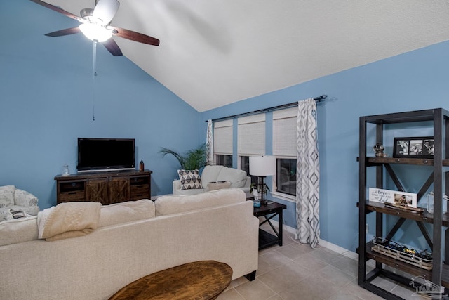 living room featuring light tile patterned floors, lofted ceiling, and ceiling fan