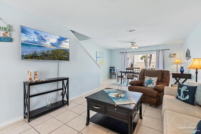 1440 Paradise Point Dr Unit 13, Navarre Beach, FL 32566 - living area with a ceiling fan and light tile patterned flooring