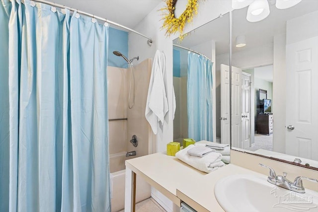 1440 Paradise Point Dr Unit 13, Navarre Beach, FL 32566 - bathroom with shower / bath combo with shower curtain and vanity