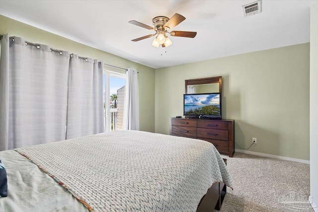 1440 Paradise Point Dr Unit 13, Navarre Beach, FL 32566 - bedroom with carpet floors and ceiling fan