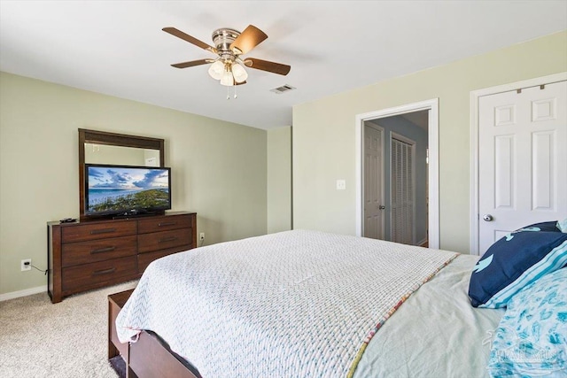 1440 Paradise Point Dr Unit 13, Navarre Beach, FL 32566 - bedroom featuring light carpet and ceiling fan