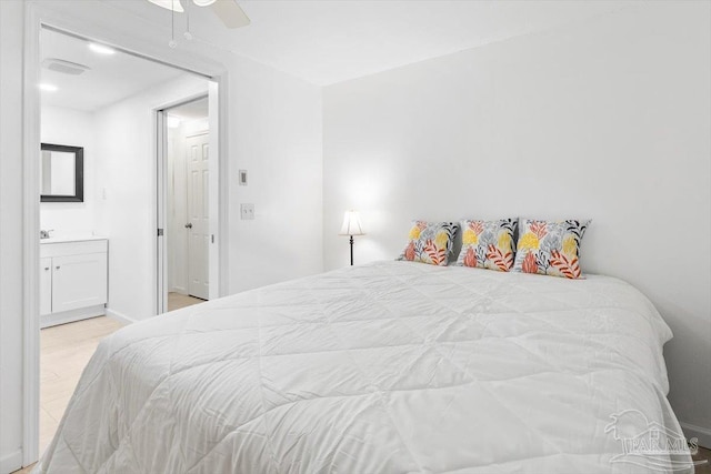 1440 Paradise Point Dr Unit 13, Navarre Beach, FL 32566 - bedroom featuring connected bathroom and ceiling fan