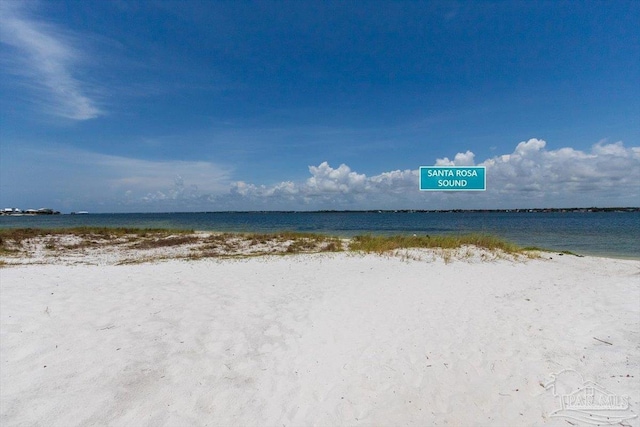 1440 Paradise Point Dr Unit 13, Navarre Beach, FL 32566 - water view featuring nearby beach