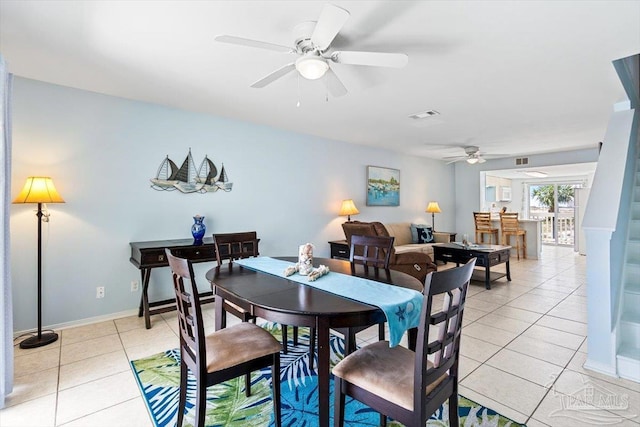 1440 Paradise Point Dr Unit 13, Navarre Beach, FL 32566 - dining room featuring a ceiling fan and light tile patterned floors